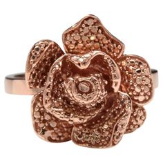 Beautiful 14K Solid Rose Gold Flower Ring Suggested Replacement Value: $1,300.00 Stamped: 14K Flower Measures: 16.60 x 16.25mm Ring size: 6.5 (free sizing available) Item total weight: 6.1 grams Disclaimer: all weights, measurements and colors are approximate and may vary slightly from the listed dimensions or as seen in the image. All pictures are magnified to show the smallest of details. Please, refer to the item description for actual weight and size evaluation. SKU #TF34 Emerald Cut Aquamarine Ring, Rose Gold Flower Ring, Expensive Rings, Gold Flower Ring, Rose Gold Flower, Emerald Cut Rings, Tanzanite Ring, Rose Gold Band, Aquamarine Rings