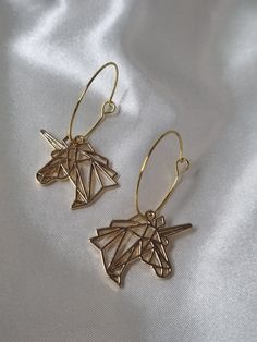 Featuring a Unicorn in a geometric design which has been turned into earrings 🦄  Grade 925 Sterling Silver French Hooks (hypoallergenic and anti allergen). Thank you for visiting my shop and send me a message if you have further questions! 🤍✨ Geometric Hoop Earrings Gift, Geometric Hoop Earrings As A Gift, Trendy Geometric Earrings For Gifts, Geometric Hypoallergenic Jewelry For Gifts, Hypoallergenic Drop Earrings, Sterling Silber, Geometric Design, Jewelry Earrings Dangle, Etsy Earrings