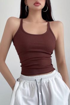 Item Type: Top Material: Polyester Pattern: Solid Collar: Round Neck Sleeve Length: Sleeveless Color: Black, White, Brown, Gray Size: S,M Size(cm) Top Length Bust S 49 60 M 50 64 Fitted Sleeveless Tank Top Casual, Fitted Sleeveless Casual Tank Top, Brown Stretch Sleeveless Crop Top, Brown Stretch Camisole For Summer, Stretch Brown Camisole For Summer, Trendy Brown Sleeveless Crop Top, Solid Cotton Halter Neck Tank Top, Solid Color Cotton Halter Neck Tank Top, Brown Stretch Sleeveless Tank Top