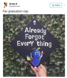 someone holding up a graduation cap with the words already forgot everything in front of them