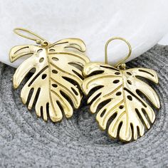 Monstera leaf earrings handmade brass waterproof hook dangles for women Trendy Leaf-shaped Jewelry Gift, Trendy Gold Leaf Jewelry, Trendy Handmade Brass Earrings, Handmade Metal Leaf Jewelry, Handmade Gold Hoop Earrings With Nature-inspired Style, Handmade Gold Leaf Earrings, Handmade Gold Hoop Earrings Nature-inspired, Bohemian Gold Leaf Jewelry, Handmade Gold Nature-inspired Hoop Earrings