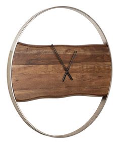 a clock made out of wood and metal on a white background with an x in the middle