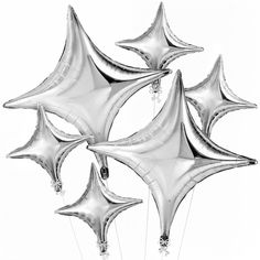 five silver star balloons in the shape of stars