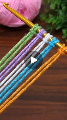 the video shows how to crochet with yarn and needles in this simple technique