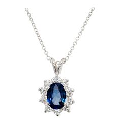 Cornflower blue Sapphire and diamond pendant necklace. Oval sapphire with a halo of 10 round ideal full cut diamonds in 18k white gold. 17.50 inch chain. 2 cornflower blue oval Sapphire, approx. total weight 1.00cts, VS2, 7 x 5mm, natural color simple heat only. 10 round Ideal full cut diamonds, approx. total weight .42cts, F to G, VS 18k white gold Tested and stamped: 18k Hallmark: P 2.2 grams Length: 17 1/2 inches Chain width: 1mm Cornflower Blue Sapphire, White Gold Pendant Necklace, White Gold Pendant, Blue Sapphire Diamond, Cornflower Blue, Diamond Pendant Necklace, Gold Pendant Necklace, Sapphire Diamond, Diamond Pendant