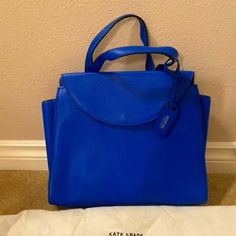 Never Used Cobalt Blue Kate Spade Saturday Purse. Luxury Blue Handheld Satchel, Designer Blue Handheld Satchel, Designer Blue Bag With Double Handle, Designer Blue Satchel With Detachable Strap, Designer Blue Satchel Shoulder Bag, Modern Handheld Blue Shoulder Bag, Modern Blue Handheld Shoulder Bag, Blue Top Handle Shoulder Bag, Blue Top Handle Bag For Office