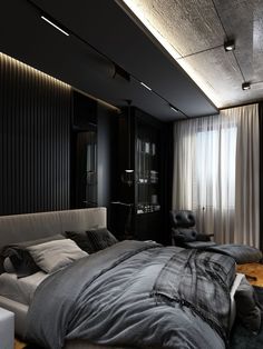 a large bed sitting in the middle of a bedroom next to a window with curtains