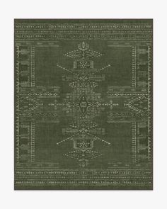 a green rug with an intricate design on the front and back side, in grey tones