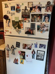 a refrigerator covered in magnets and pictures