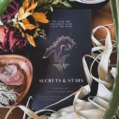 poetry book with a fox, mushrooms, ferns and a black cover, title reads: Secrets and Stars by Alix Klingenberg Star Poetry, Best Poetry Books, Wild Magic, Botanics Skin Care, Acid Base Balance, Acne Products, Novel Covers, Unitarian Universalist, Club Lighting