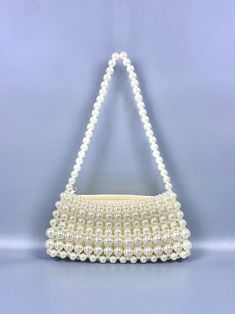 Be stylish and comfortable in our vintage pearl chain handbag. Perfect for casual outings, weddings, or parties, this LikeMyChoice® bag effortlessly combines style and comfort. Pair it with your most dressy or evening gown for a stylish yet relaxed look. Drape Maxi Dress, Chain Handbag, Printed Balloons, Vintage Pearl, Long Drop Earrings, Maxi Knit Dress, Vintage Pearls, Silver Drop Earrings, Pearl Chain