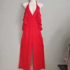 Romeo + Juliet Couture Spice Red Ruffled Pantsuit Jumpsuit Romper Size M Red Summer Formal Jumpsuits, Red Chic Jumpsuits And Rompers With Ruffles, Red Sleeveless Jumpsuits And Rompers For Date Night, Elegant Red Jumpsuits And Rompers For Spring, Sleeveless Red Jumpsuits And Rompers For Date Night, Chic Red Jumpsuit With Ruffles, Red One-piece Jumpsuit For Spring, Spring Red Pantsuit For Night Out, Red Pantsuit For Spring Night Out