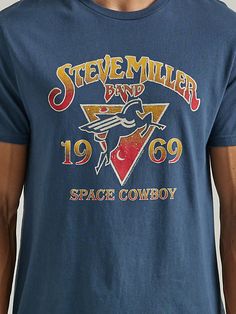 ARE YOU READY FOR THAT? Whether you're a space cowboy, a gangster of love, or just love an old-school band tee, this Steve Miller Band Graphic Tee was made for you. With a regular fit and 100% cotton design, this classic crewneck tee lets you live the music you love while rocking a vintage-inspired look. Plus, it features a retro-inspired graphic with the band's iconic artwork of a Pegasus. © 2023 Sailor Music Group, Inc. Under License to Epic Rights Steve Miller, Steve Miller Band, Graphic Band Tees, Western Shop, Iconic Artwork, Space Cowboy, Workwear Jeans, Wrangler Shirts, Mens Workwear