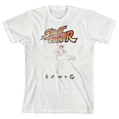 Celebrate your favorite video games in style with this Street Fighter Classic tee. The shirt features a faded image of Ryu above a sequence of buttons while orange and yellow letters above the image spell out the game's logo. The tee comes in a white short sleeve crew neck. Street Fighter fans will love this comfy cotton tee. White Gamer T-shirt With Graphic Print, White Gamer Graphic Print T-shirt, Gamer Style Screen Print T-shirt For Streetwear, Gamer Style Graphic Print Short Sleeve Shirt, Cotton Gamer T-shirt For Streetwear, Gamer Style White Top For Streetwear, White Gamer Tops With Graphic Print, White Cotton Gamer T-shirt, Boys White T Shirt