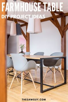 a dining room table with grey chairs and wooden beams