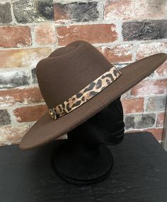 A Short brim brown Leopard Fedora. This a show stopper a unisex Fedora that can make a simple garment stand out. Try A New Thing!Don't delay order today. Leopard Belt, Brown Leopard, Black Leopard, Fedora, Caps Hats, Accessories Hats, Birthday Gift, Bathing Beauties, Birthday Gifts