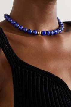 Drawing inspiration from modern art, Mateo's fine jewelry collections focus on simplicity and minimalism. This 14-karat gold necklace is strung with vibrant lapis lazuli beads and has the label's signature 'M' charm at the adjustable fastening. Wear it with your favorite tees and knitted tanks, or layer it beneath the collar of a classic shirt. Lapiz Lazuli Necklace, Lapis Lazuli Beaded Necklace, Lapis Lazuli Jewelry Necklaces, Gemstone Necklace Diy, Blue Beads Necklace, Pirate Mermaid, Healing Beads, Jewelry Minimal, Blue Statement Necklace