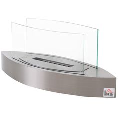 a glass display case on top of a metal counter with an electronic device in it