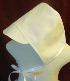 Darling christening hat, blessing hat, baptism hat, goes with any of our boy outfits. Hat is handmade to fit the measurements of your baby. Made of cotton twill with a ribbon bow under the chin. Please give me a measurement from the bottom of one ear over the top of the head to the bottom of the other ear with your order I usually ship first class within 1-3 business days for free. You can upgrade to priority at checkout. You can also upgrade to express if needed. Please let me know exactly when Adjustable Cream Bonnet As A Gift, Adjustable Cream Bonnet As Gift, White Adjustable Hat For Baptism, Adjustable Cream Bonnet For Baptism, White Adjustable Bonnet For Wedding, White Adjustable Wedding Bonnet, Classic White Hats For Church, Adjustable Cream Hat For Gifts, Adjustable Cream Hat For Gift