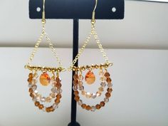 Crystals in shades of brown and orange. Color Chandelier, Brown And Orange, Shades Of Brown, Wire Earrings, Simple Jewelry, Chandelier Earrings, Fall Colors, Etsy App, Selling On Etsy