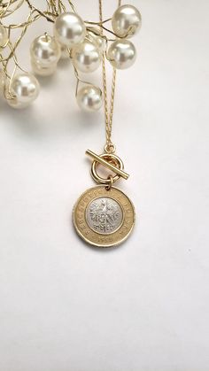 Celebrate one's Polish heritage with the gift of this necklace. You can choose between the bimetallic 2 zlote or 5 zlotych Polish coin that dangles from an 18" gold plated chain.  The chain with the back lobster clasp has a 3" chain extender making the overall length versatile. The chain with the front toggle clasp is 18" and not variable. The 2z coin is 20mm in diameter. The 5z coin is 24 mm in diameter. Welcome to Recycled Finery!  I repurpose old jewelry, coins, beads, vintage buttons, watch Eagle Jewelry, Polish Heritage, Birthday Gift For Sister, White Eagle, Beauty Gadgets, Coin Earrings, Watch Parts, Gift For Sister, Birthday Gifts For Sister