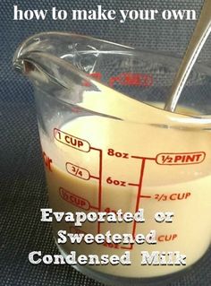 a measuring cup filled with liquid on top of a table