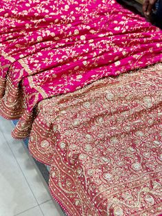 A perfect Rani Pink Banarasi Silk Saree adorn with pearls, stones and zardozi. Luxury Banarasi Silk Embroidered Fabric For Reception, Luxury Silk Thread Saree With Dabka Work, Banarsi Bridal Saree, Rani Pink Bridal Saree, Pink Embroidered Fabric With Dabka Work For Reception, Embroidered Pink Fabric With Dabka Work For Reception, Silk Thread Embroidered Fabric For Eid Reception, Silk Embroidered Fabric With Dabka Work For Wedding, Silk Dupatta With Dori Work For Reception