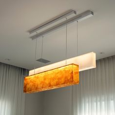 a rectangular light fixture hanging from the ceiling