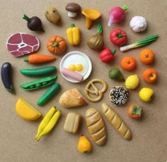 there are many different fruits and vegetables in the shape of a circle on the table