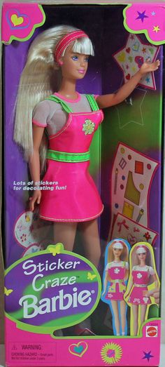 the barbie doll is wearing a pink dress