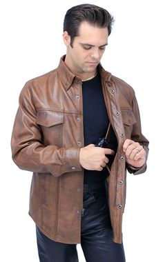 A men's brown leather shirt with a new tan antiqued finish for that well loved look. An amazingly comfortable men's shirt considered a lightweight leather jacket in premium soft lambskin leather. This lightweight brown leather shirt snaps and zips up front with features that include 2 front snap down chest pockets, 2 snap closed front belly pockets, adjustable double snap cuffs, long body style and a soft satin lining. Exclusive Jamin Leather® quality brand shirt. This men's brown leather shirt Brown Casual Leather Jacket With Snap Buttons, Casual Brown Leather Jacket With Snap Buttons, Brown Single Breasted Leather Jacket With Collar, Denim Shirt Styling, Brown Collared Leather Jacket With Buttons, Brown Single Breasted Collared Leather Jacket, Brown Leather Jacket With Snap Buttons, Brown Collared Leather Jacket With Snap Buttons, Brown Leather Button-up Jacket With Button Cuffs