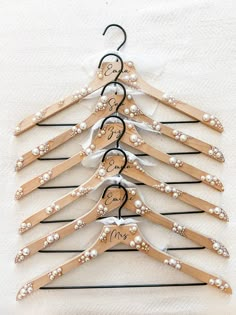 wooden wedding dress hangers with personalized names and pearls