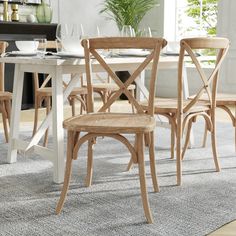 a dining room table with chairs around it