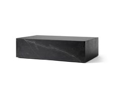 a black marble block on a white background