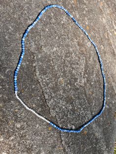 blue and clear beaded waist beads. beads have a marble effect very stretchy Blue Beaded Waist Beads, Adjustable Blue Waist Beads For Beach, Blue Polished Beads For Beach, Waist Beads, Belly Chain, Marble Effect, Body Jewelry, Marble, Ships