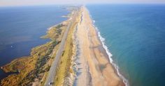 an aerial view of the beach and ocean from a bird's - eye view