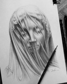 a pencil drawing of a woman's face with long hair and veil on her head