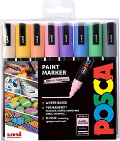 a box of 12 assorted water based acrylic paint markers and markers