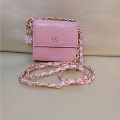 Chanel Lambskin Compact Pink Wallet/Crossbody Purse. I Added Unbranded Chain 47"And Key Chain. All Snaps Are Original And Work Good. Exterior Of Wallet Shows Sign Of Wear And Stain. Interior Of Wallet Has Some Stain. Serial Number:9083769. Made In Italy. Pink Wallet, Compact Wallet, Crossbody Purse, Key Chain, In Italy, Stain, Chanel, Purse, Exterior