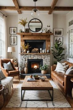 a living room with two couches and a fire place in it's center