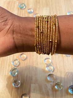 These wrap bracelets are the perfect accessory to add to any Summer outfit! Every color adds a little "umph" to your outfit no matter the occasion! One Size fits ALL! Gold Wrap Bracelet With Tiny Beads As A Gift, Gold Multi-strand Wrap Bracelet For Gift, Multi-strand Bracelet With Gold Beads As Gift, Multi-strand Gold Beads Bracelet Gift, Gold Multi-strand Beaded Bracelet As Gift, Bohemian Gold Friendship Bracelets For Party, Gold Bohemian Friendship Bracelets For Party, Gold Hand-strung Wrap Bracelet Gift, Gold Hand-strung Wrap Bracelet For Festivals