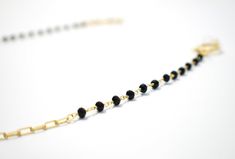 If you're looking for a subtle and classy piece, this chain is the one for you. The elegant gold loops and black spinal stone make for a delicate yet versatile combination. Whether you're going for a casual vibe or a fancy night out, this chain can be styled for any occasion. Gold Glasses, Black Gems, Glasses Chain, Black Spinel, Classic Gold, Gold Chain, Gold Chains, Are You The One, Vintage Inspired