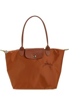 Longchamp Medium Le Pliage Green Recycled Canvas Shoulder Tote Bag | Nordstrom Waterproof Leather Bags, Classic Nylon Shoulder Bag For Shopping, Classic Nylon Shoulder Bag With Double Handle, Classic Brown Nylon Bag, Double Handle Nylon Shoulder Bag With Leather Trim, Nylon Shoulder Bag With Leather Trim And Double Handle, Longchamp Le Pliage Brown, Brown Nylon Bag With Leather Trim, Le Pliage Medium