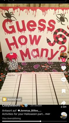 a board game with the words guess how many? written in red and black on it