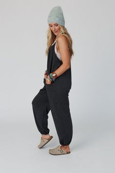 Excited to bring you the Comfort Zone Pocketed Jumpsuit from our exclusive collection; The Nest by Three Bird Nest. Check out the rest of the collection here - Inspired by you, created by us. Fit for it's name sake this will be your new easy on-the-go piece because it features: Comfortable, lightweight, stretch knit fabric Loose and slouchy jumpsuit silhouette Flattering scoop neckline with a gathered detail along the front and back Adjustable spaghetti straps Cute patch pocket details along the Gray Cotton Jumpsuits And Rompers For Loungewear, Cotton Jumpsuits And Rompers With Side Pockets For Lounging, Cotton Jumpsuits With Side Pockets For Lounging, Casual Gray Jumpsuits And Rompers For Lounging, Slouchy Jumpsuit, Cute Jumpsuits, Free People Jumpsuit, The Comfort Zone, Three Bird Nest