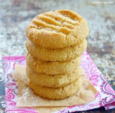 a stack of cookies sitting on top of a napkin