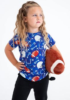 This daywear must-have boasts a stylish pocket detail. Lightweight and breathable bamboo elevates comfort, as well as offers versatility—whether layered or worn alone. Complete your game-day outfit with this adorable tee! [tshirts, boy clothing, girl clothing, toddler girl style, toddler boy style, toddler boy clothing, toddler girl clothing, football tshirts, football tees, fall outfits 2023, football game outfits, fall fits, fall outfits] Shop Birdie Bean today! Football Game Outfits