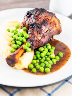 Minted lamb shanks slow cooked in the oven in a mix of red wine and stock that makes the perfect base for an outstanding gravy! Lamb Shanks Slow Cooker, Lunch For Two, Lamb Shank Recipe, Buttery Mashed Potatoes, Slow Cooker Lamb, Braised Lamb Shanks, Lamb Shank, Braised Lamb, Leg Of Lamb