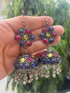 Exude the classic desi girl style with these boho multicoloured stone jhumkas.  Channel your inner Bollywood diva with these antique earrings that are the perfect with both Indian and western outfits. Styling your Kurtis and sarees has never been easier when you have these beautiful earrings in your jewellery collection.  In case of any queries, please feel free to contact us. Happy shopping! Kurti Outfit, Oxidized Earrings, Outfits Styling, Diwali Party, Outfit Jewelry, Desi Girl, Jewelry Indian, Jewelry Outfit, Antique Earrings