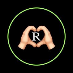 two hands making a heart shape with the letter r in front of them on a black background